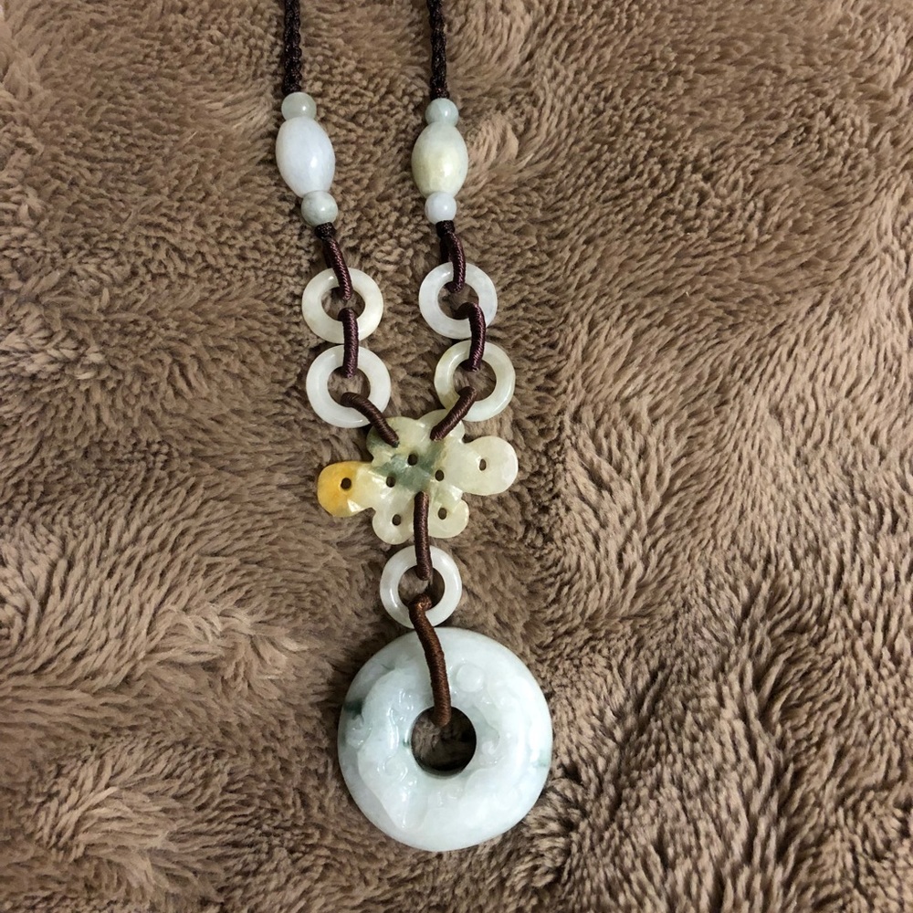 Jade corded necklace.